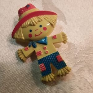 Vintage Avon scarecrow scent brooch